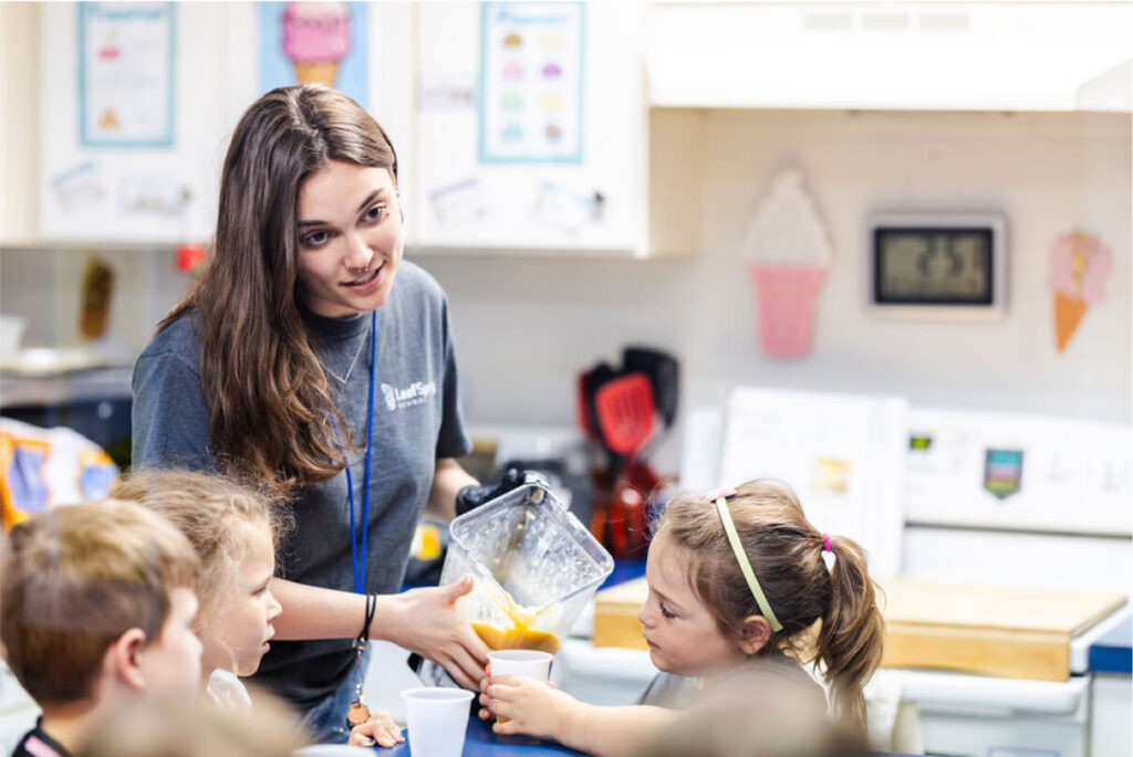 LeafSpring School teacher with students