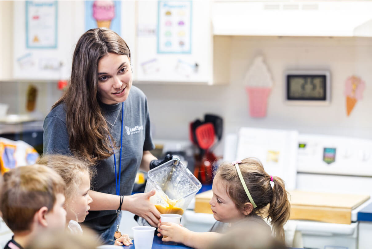 LeafSpring School teacher with students